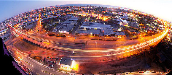 Aerial fisheye view of Melbourne highways at dusk
