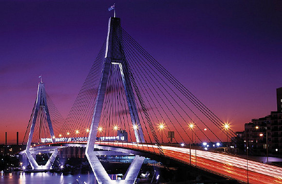 Anzac Bridge at night with Australian Flag
