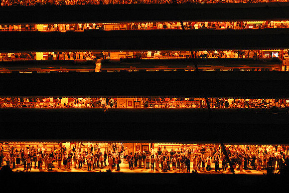 Commuters waiting on train platforms at Flinder's Street Station