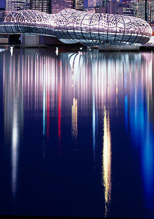 Webb Bridge at night reflected in the water